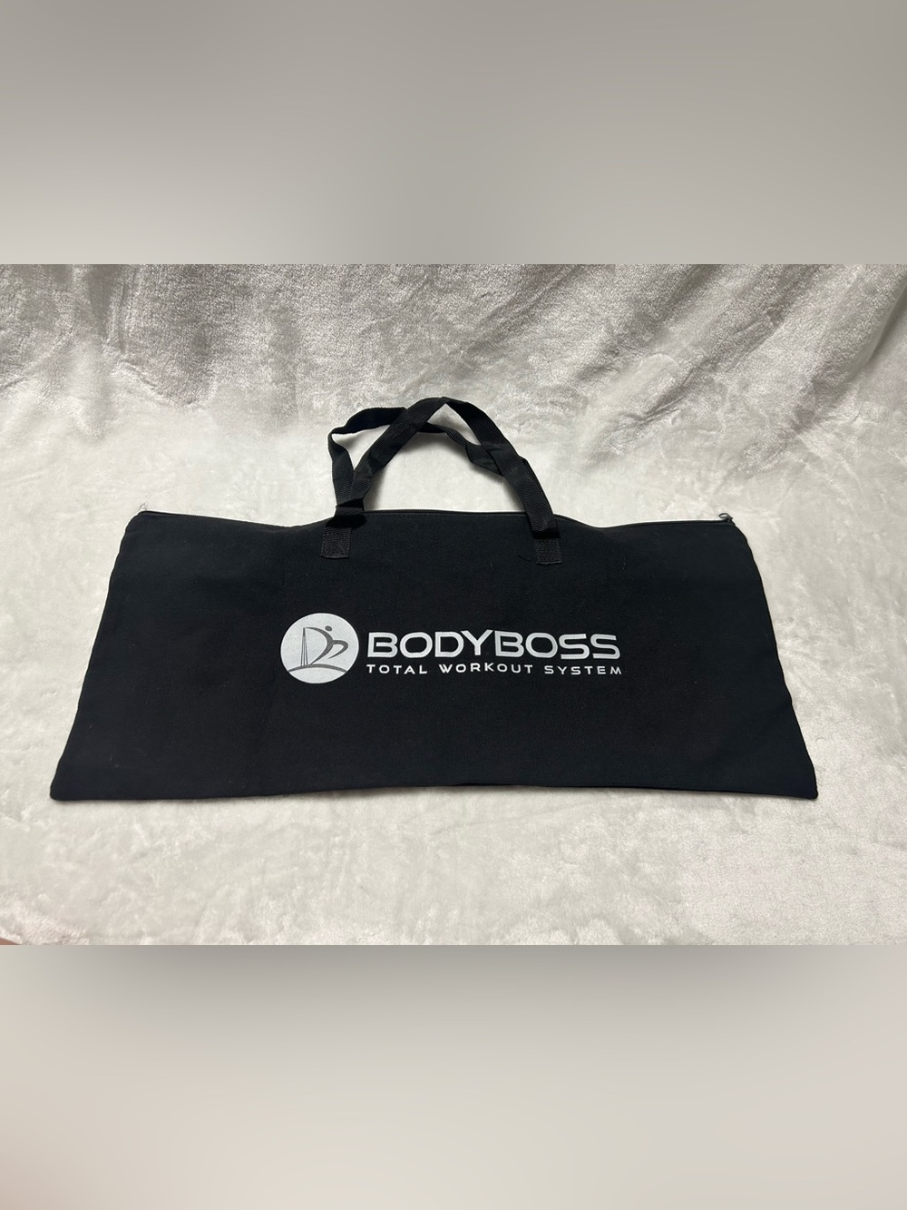 Large black zip up soft storage bag with handles
